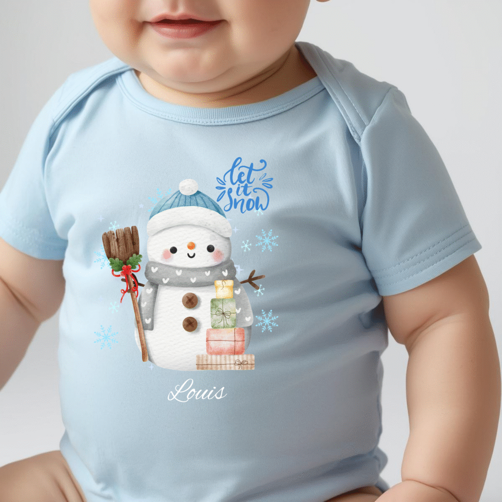 Personalised bodysuit gift presented with Christmas wrapping ideas for baby’s first holiday keepsake box